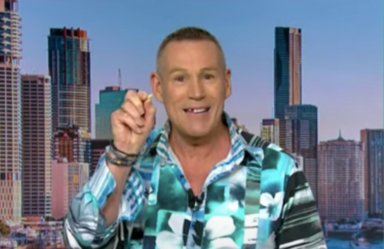 Australian reporter Craig Bennett after pulling his tooth out on air (Photo: Studio 10/YouTube)