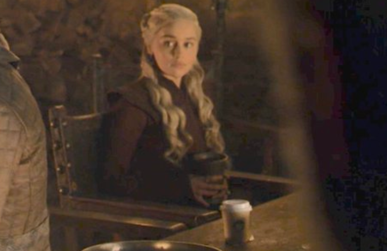 Emilia Clarke in Game of Thrones, with a Starbucks cup (Photo: HBO/Twitter)