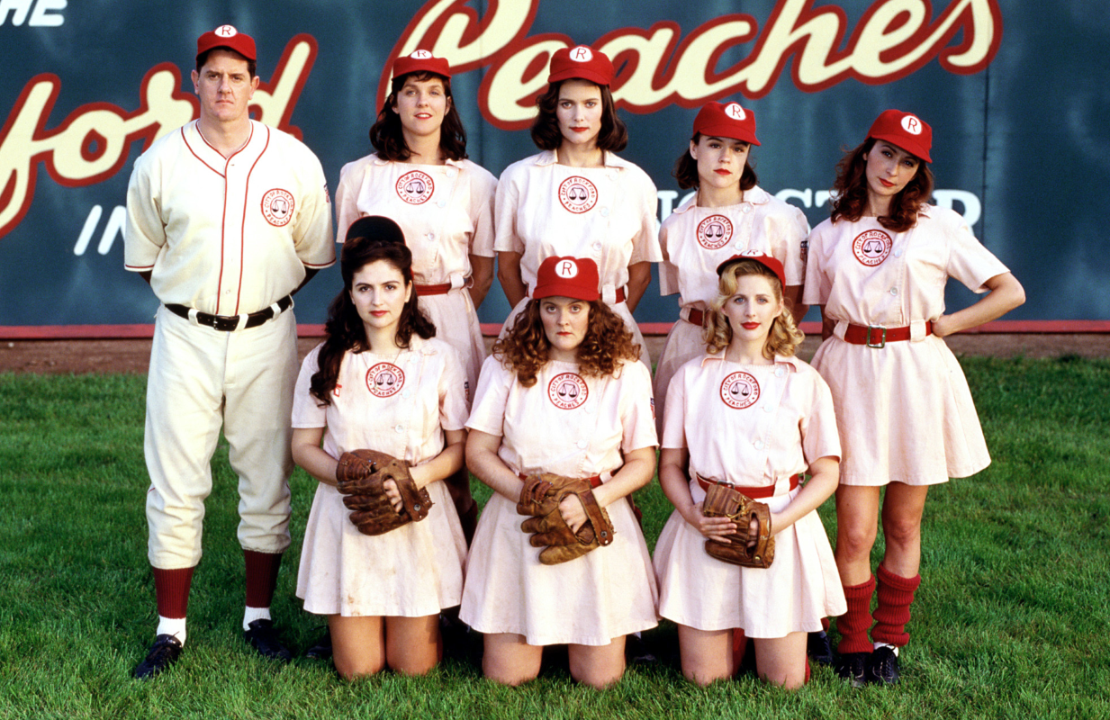 The cast of the 1993 CBS sitcom A League of Their Own:  (Front) Tracy Reiner, Megan Cavanagh, Tracy Nelson, (Rear) Sam McMurray, Katie Rich, Carey Lowell, Christine Elise, Wendy Makkena. (Photo: Sony Pictures Television/Everett Collection)