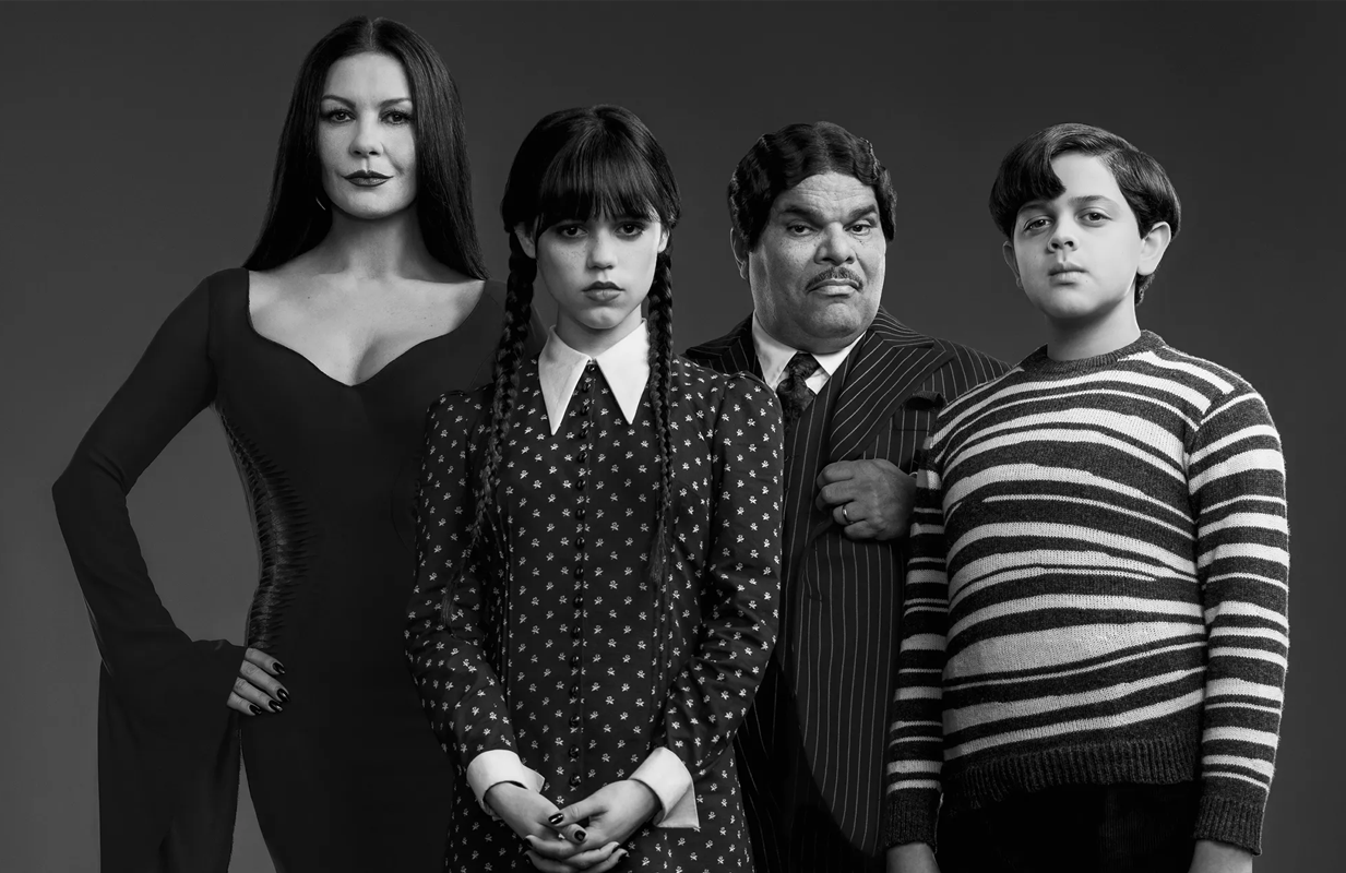 Catherine Zeta-Jones as Morticia, Jenna Ortega as Wednesday, Luis Guzmán as Gomez, and Isaac Ordonez as Pugsley in Wednesday (Photo: Vanity Fair/Netflix/Matthais Clamer)