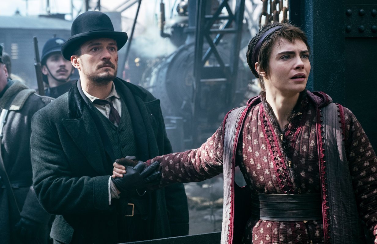 Orlando Bloom and Cara Delevingne in Carnival Row. (Photo: Prime Video) 