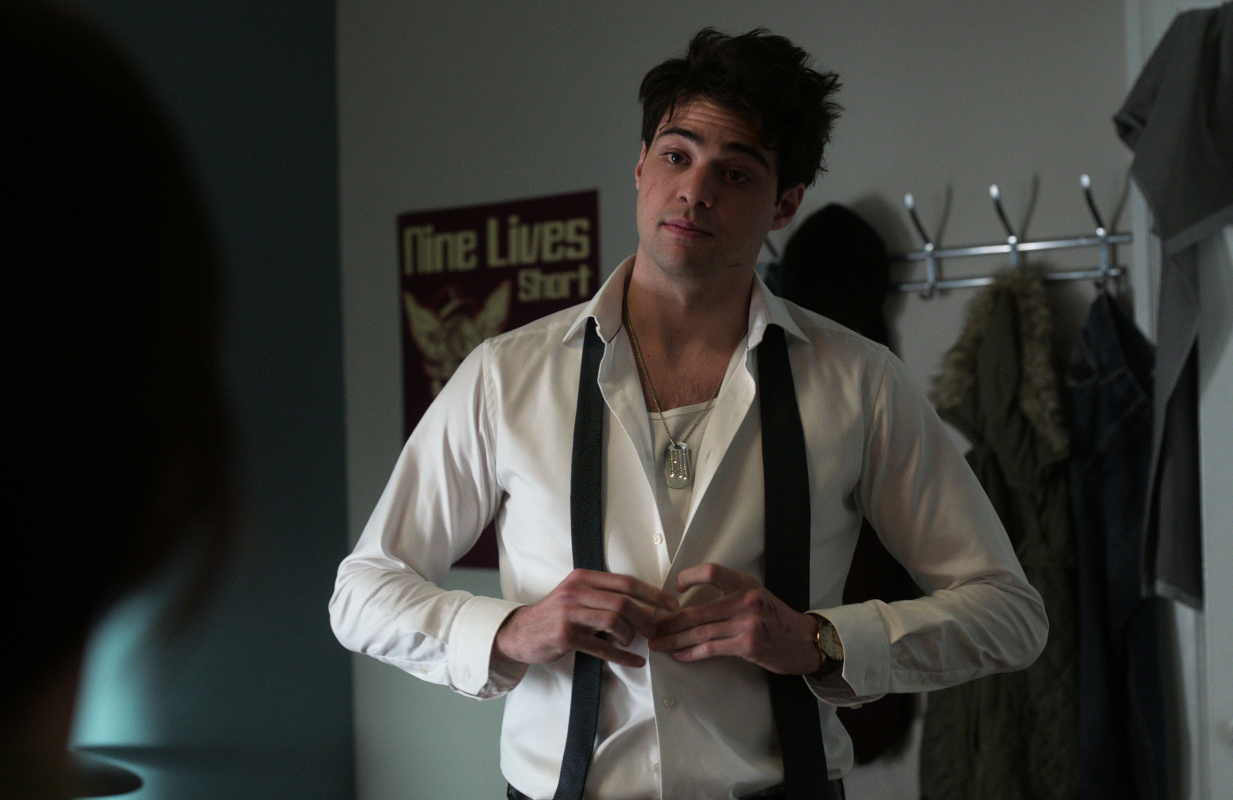 Noah Centineo puts his shirt back on in The Recruit (Photo: Netflix)