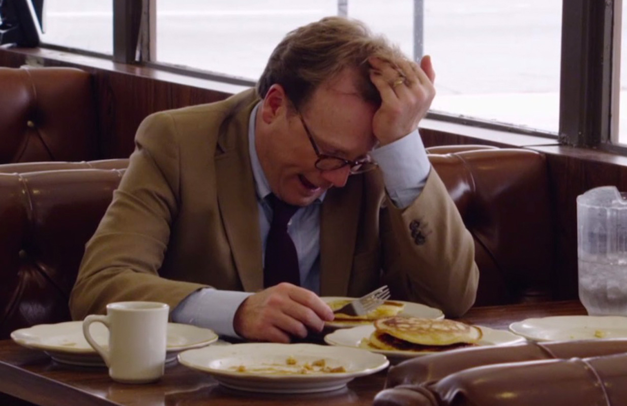Andy Daly, after way too many pancakes (Screenshot: Review)