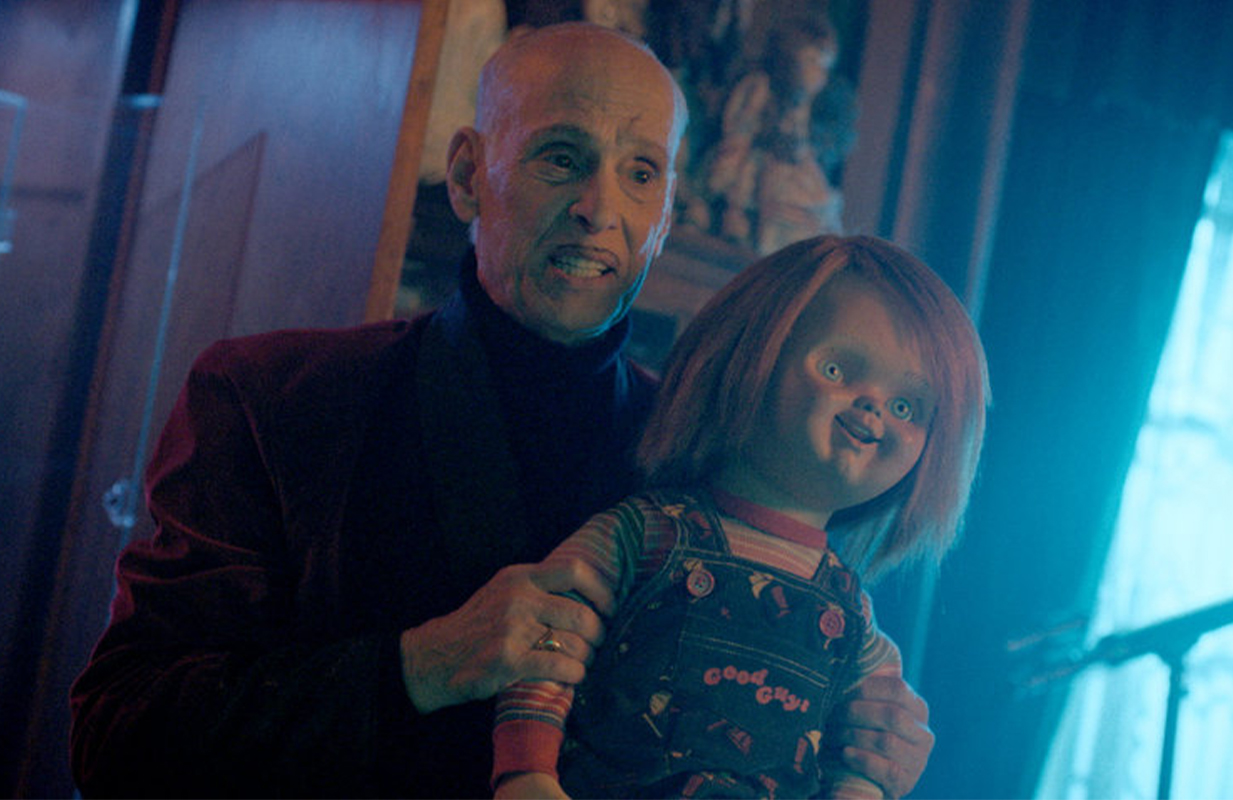 John Waters and a new/old Chucky (Photo: Syfy)