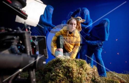 THE LEGEND OF OCHI, Helena Zengel, with Ochi, on set, 2025. © A24 /Courtesy Everett Collection