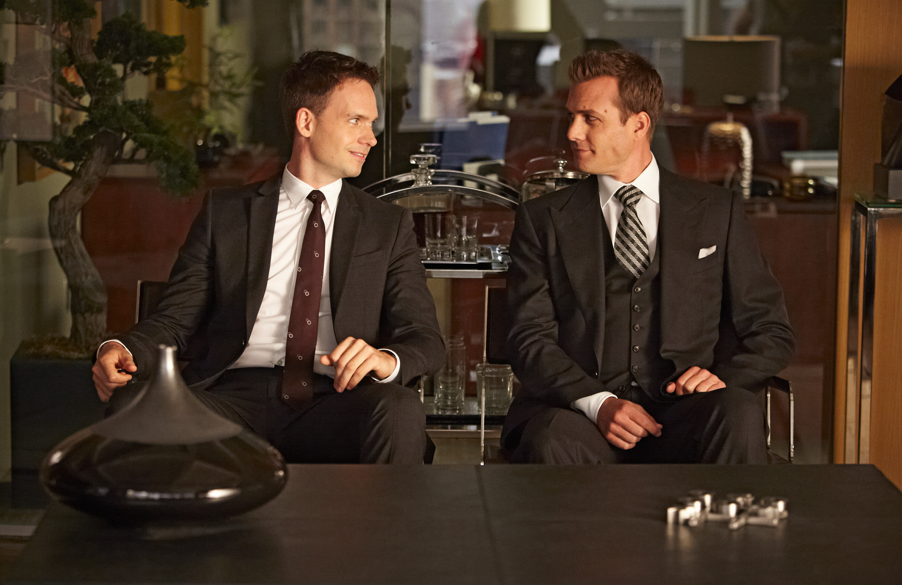 SUITS, l-r: Patrick J. Adams, Gabriel Macht in 'Unfinished Business' (Season 3, Episode 3, aired July 30, 2013), 2011-, ph: Ian Watson/©USA Network/courtesy Everett Collection