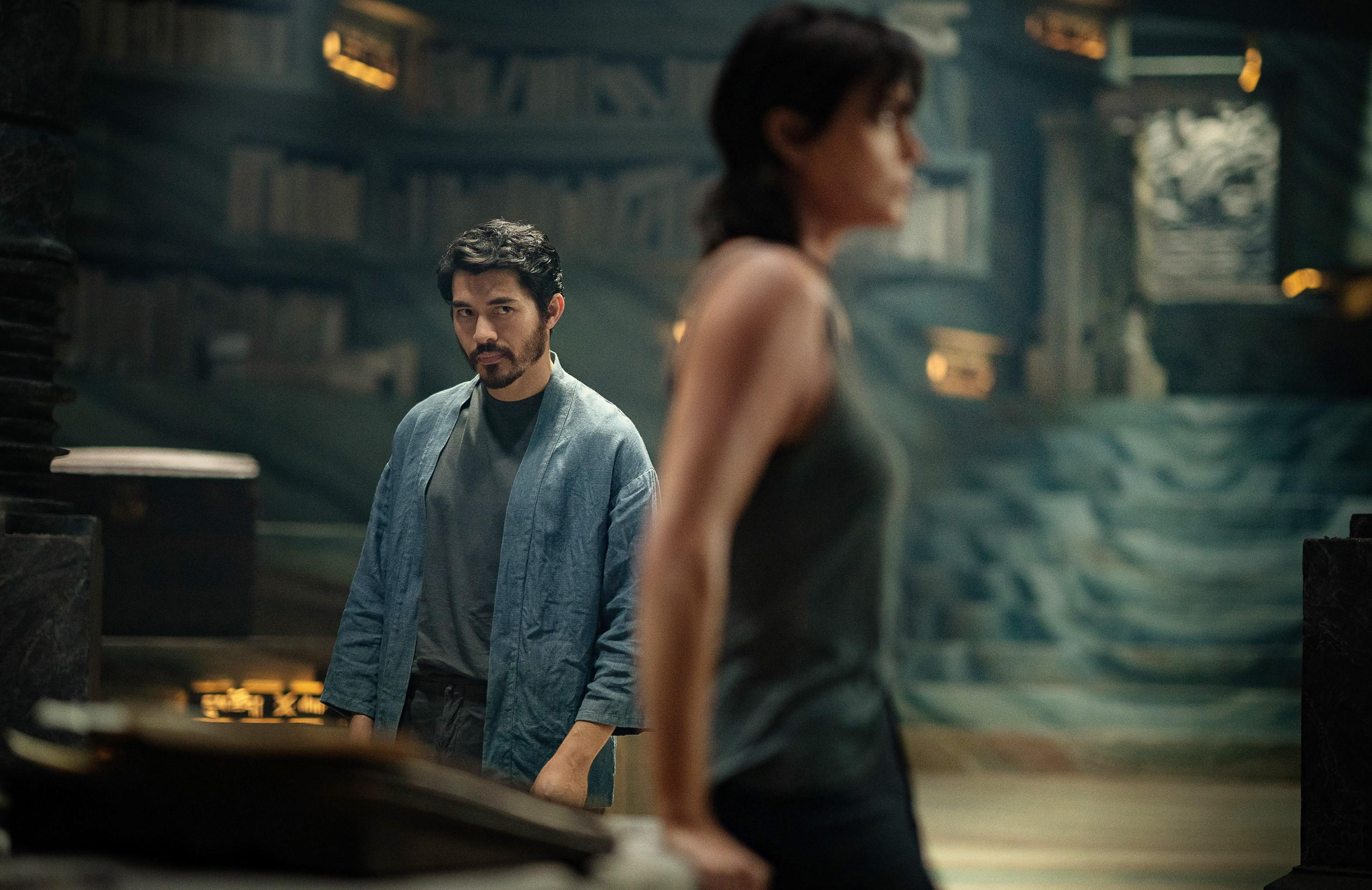 THE OLD GUARD 2, from left: Henry Golding, Charlize Theron, 2025. ph: Eli Joshua Ade / © Netflix / Courtesy Everett Collection