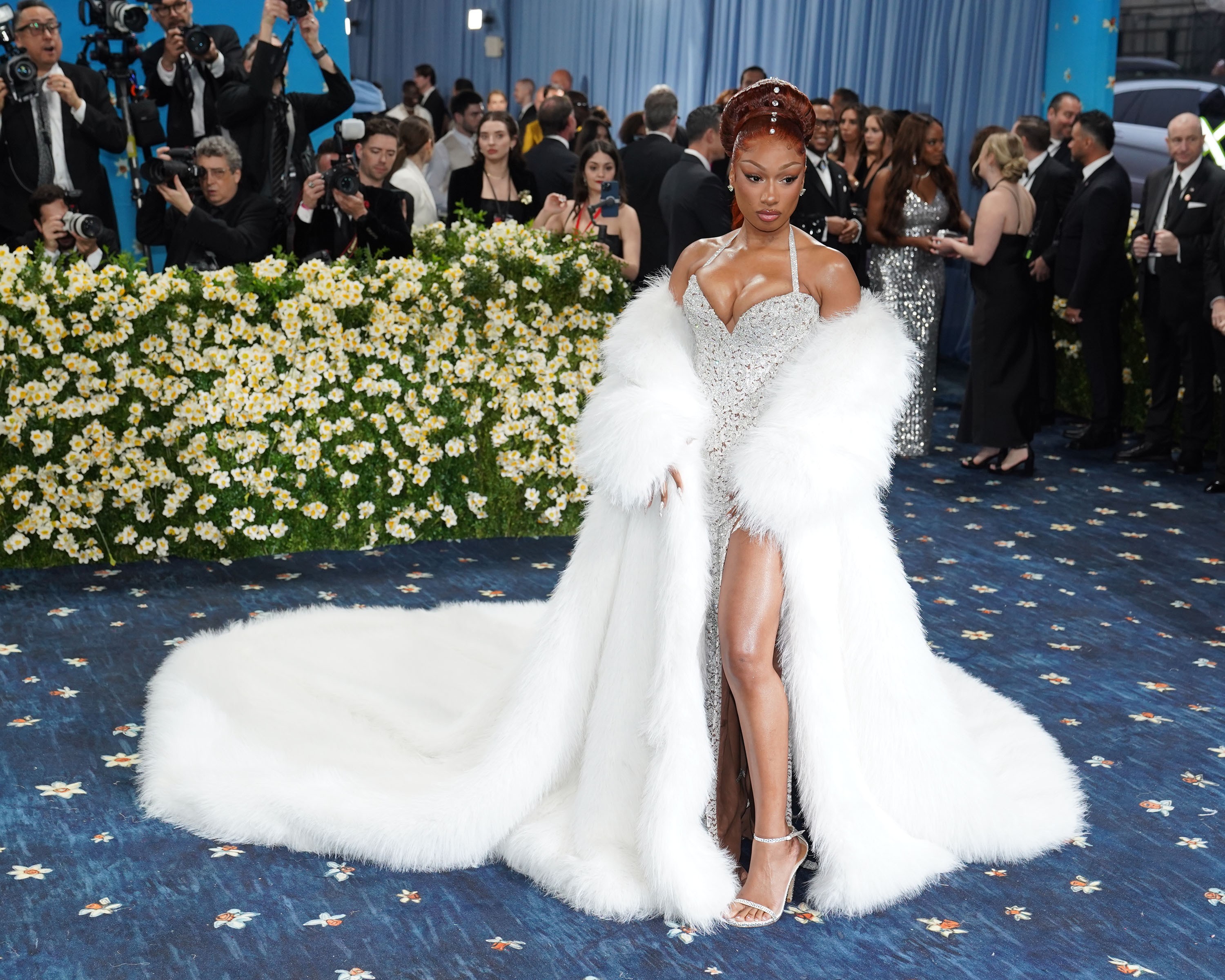 Megan Thee Stallion's gala moment sparks debate over her Roc Nation allegiance.