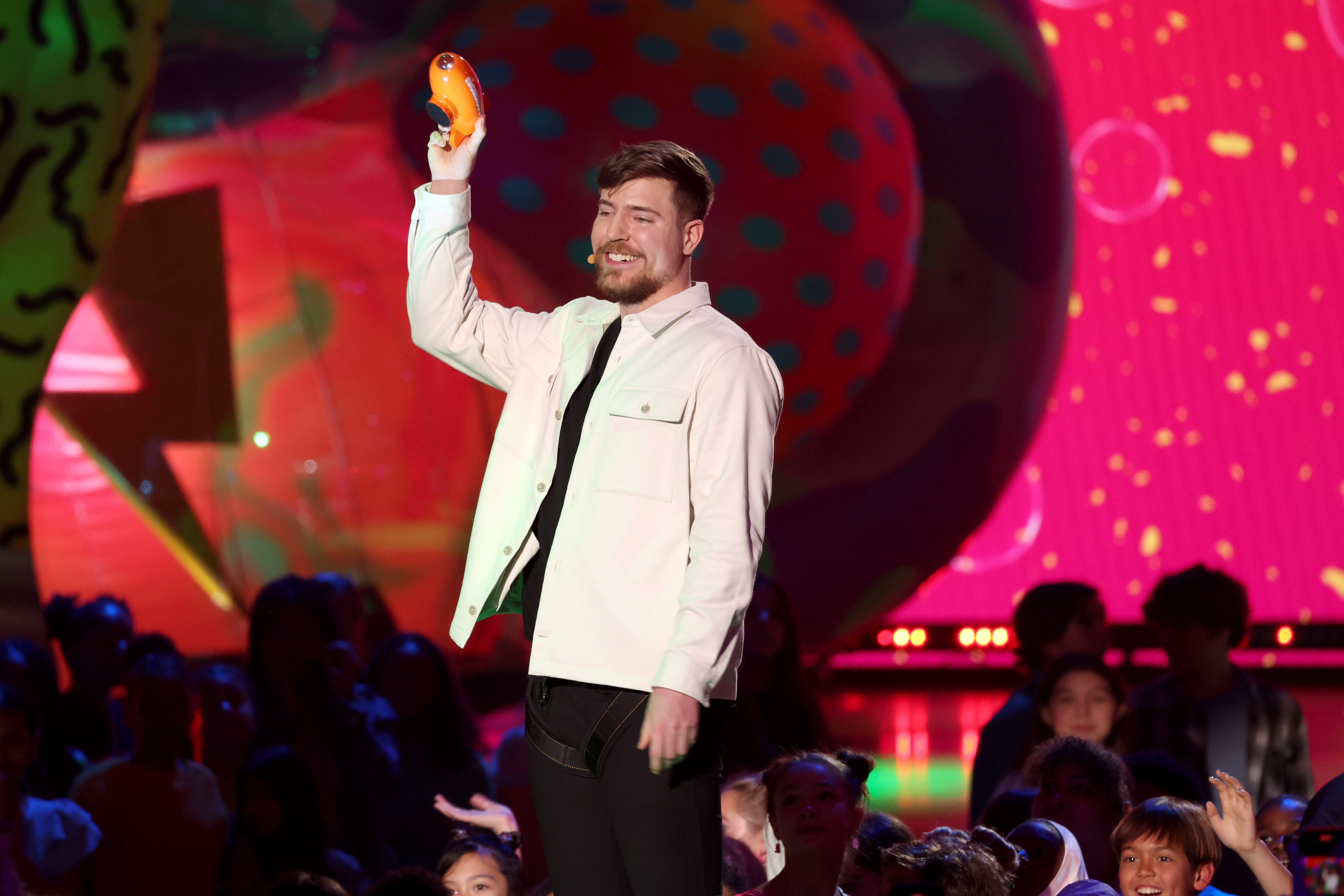 LOS ANGELES, CALIFORNIA - MARCH 04: MrBeast accepts the Favorite Male Creator award onstage during the 2023 Nickelodeon Kids' Choice Awards at Microsoft Theater on March 04, 2023 in Los Angeles, California. (Photo by Monica Schipper/Getty Images for Nickelodeon)