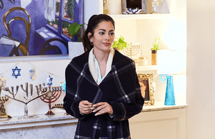 Christmas decorations are nowhere to be found in Eight Gifts of Hanukkah, starring Israeli actress Inbar Lavi. (Photo: Hallmark Channel)