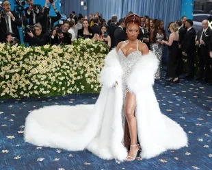Megan Thee Stallion's gala moment sparks debate over her Roc Nation allegiance.