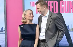Pamela Anderson and Liam Neeson during the Naked Gun premiere in NYC (Photo: Instagram/@joeyswoll)
