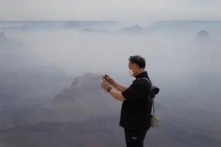 Smoke from the Dragon Bravo fire at the South Rim (Image via Getty)