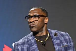 ATLANTA, GEORGIA - DECEMBER 10: Shannon Sharpe speaks onstage during 2024 HOPE Global Forum on December 10, 2024 in Atlanta, Georgia.  (Photo by Paras Griffin/Getty Images)