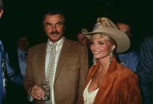 American actor Burt Reynolds and his wife Loni Anderson attend the Motion Picture & Television Fund's 8th Annual Golden Boot Awards (Photo by Vinnie Zuffante/Getty Images)